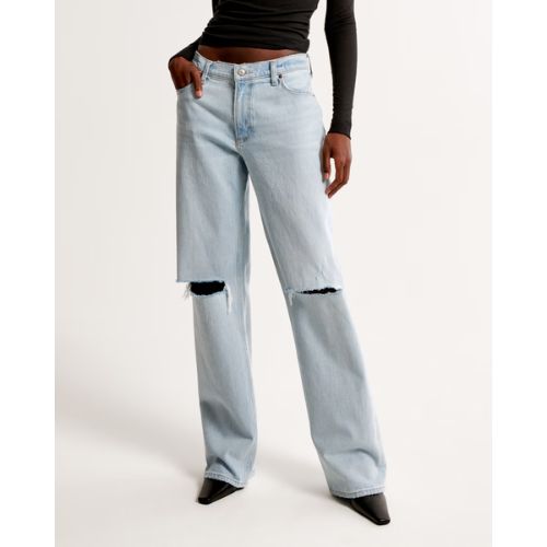 model wearing abercrombie light wash ribbed baggy jeans