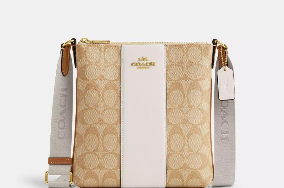 canvas and white coach file bag