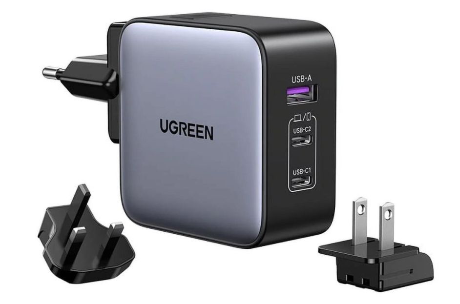 silver and black travel adapter