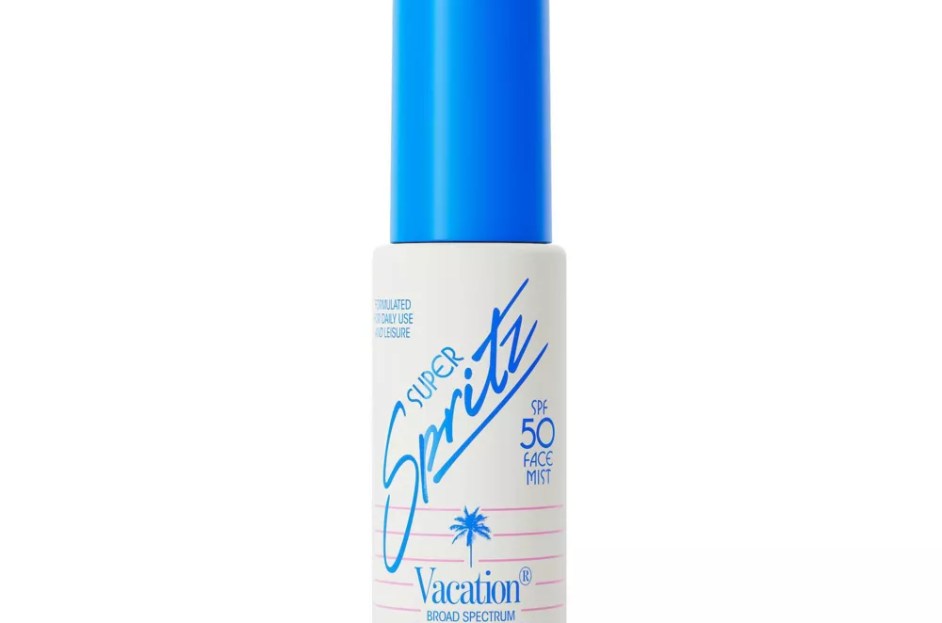 white and blue bottle of vacation facial spray