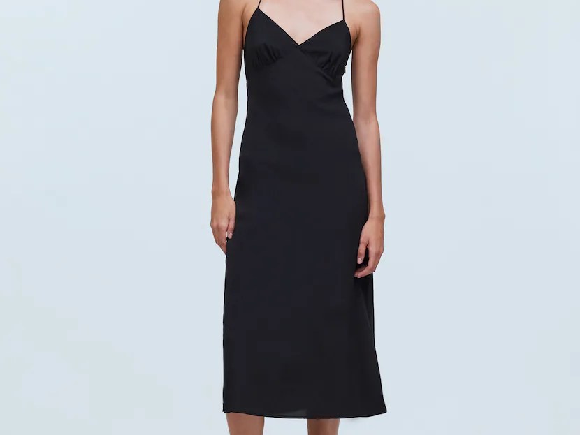 model wearing black slip dress