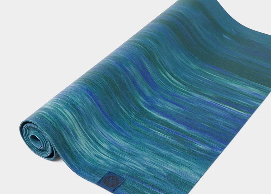 blue and green manduka yoga mat