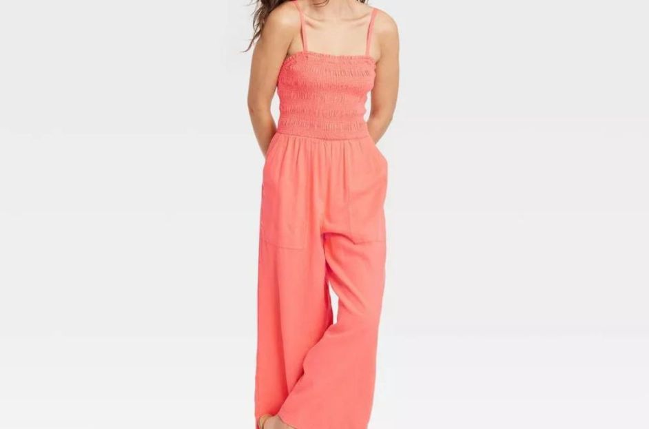 model wearing coral target jumpsuit