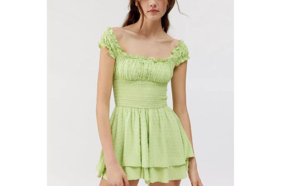 model wearing light green ruffle urban outfitters romper