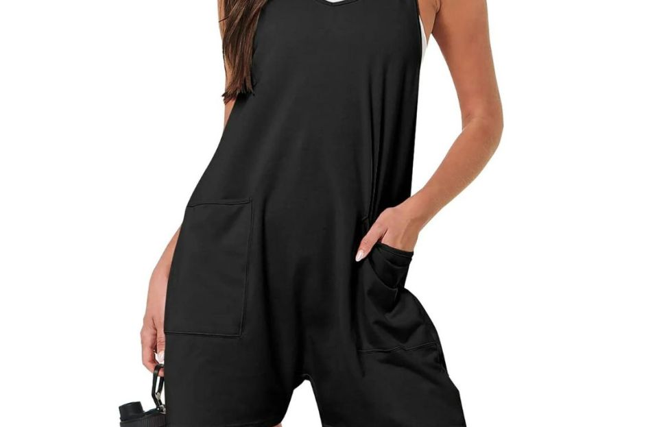model wearing black romper with pockets