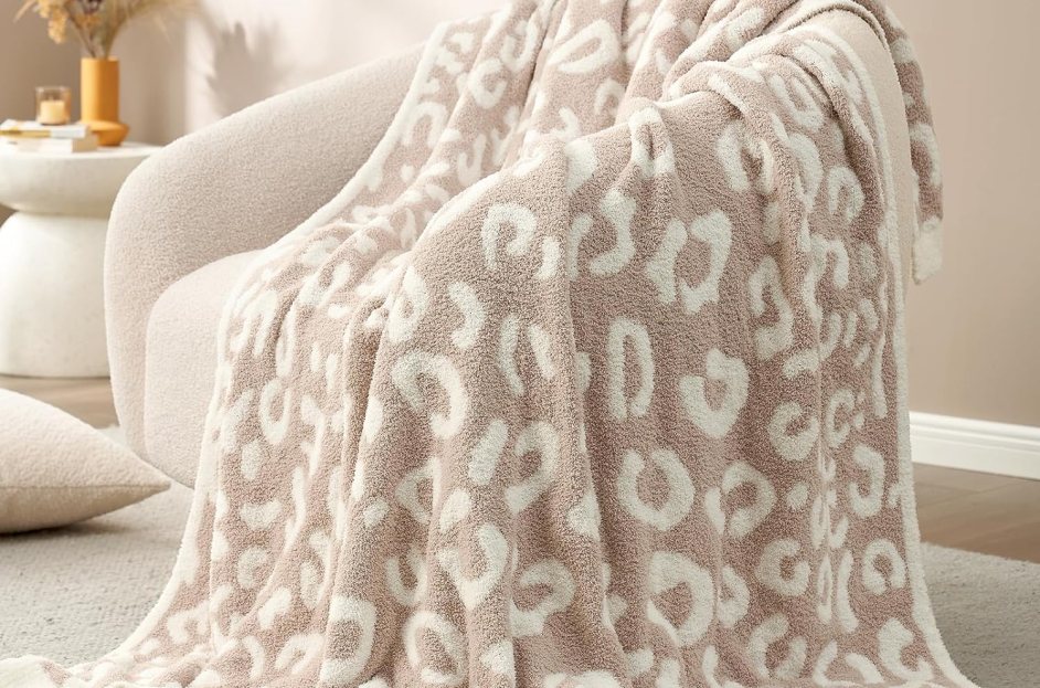 brown and cream leopard print blanket on an accent chair