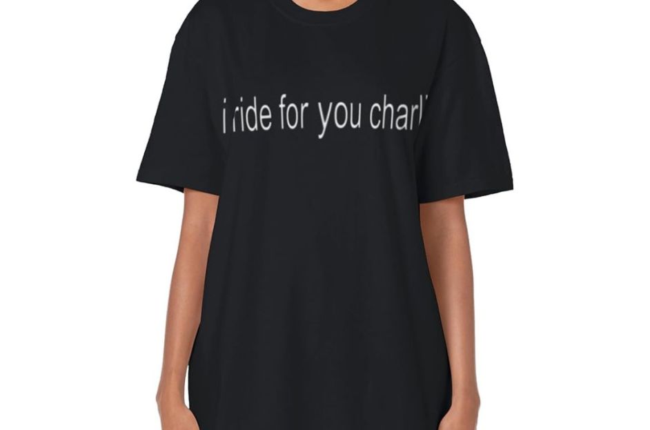 model wearing black and white "i ride for you charli" t-shirt with jeans