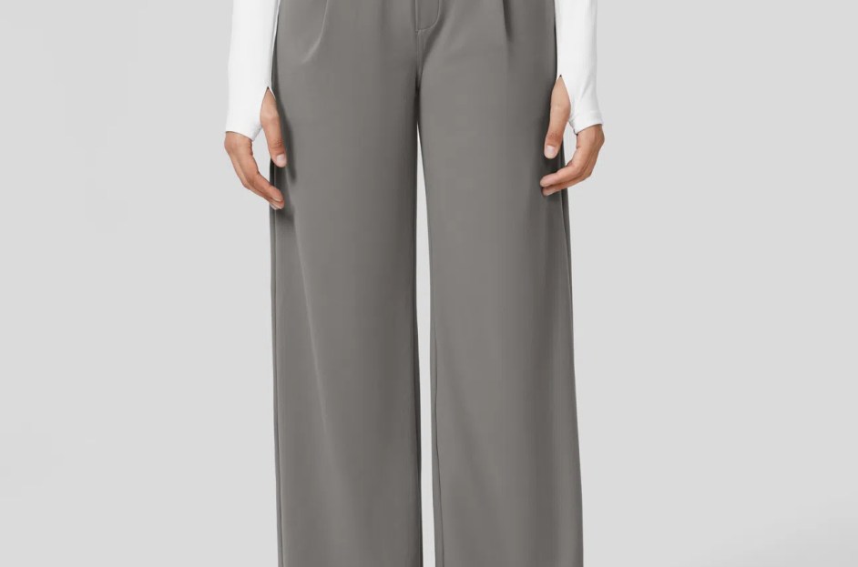 model wearing gray straight leg pants with white long sleeve