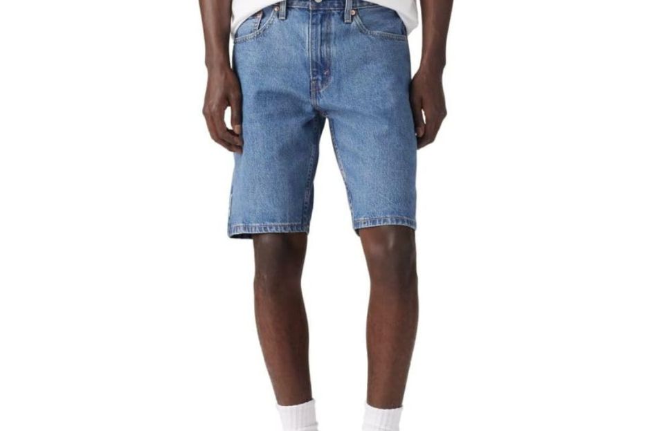 model wearing jean shorts and white t-shirt