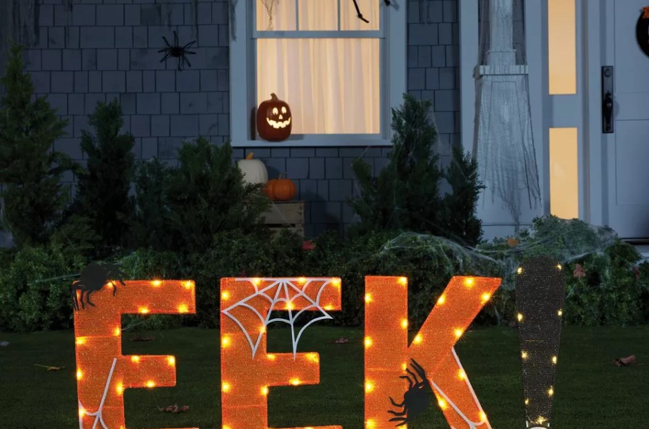 orange and yellow light up "EEK" on front lawn