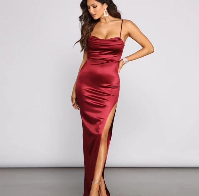 model wearing maxi satin red ruched dress