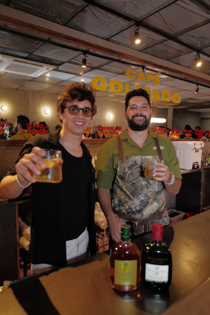SNL's Marcello Hernández and Chef Manolo Lopez celebrate the new #ComoLoDigas Buchanan's Whisky's Campaign at the soft opening of Café Colmado.