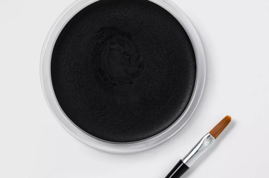 black face paint with mini brush