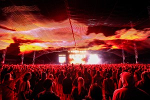 Festival goers watch Skrillex perform live on the Chevron stage during day three of Reading Festival 2024 at Richfield Avenue on August 25, 2024 in Reading, England.