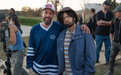 HAPPY GILMORE 2. - BTS - (L to R) Adam Sandler as Happy Gilmore and Eminem as Donald Jr. on the set of Happy Gilmore2. Cr. Scott Yamano/Netflix © 2025.